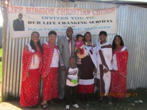 SOW Team prior to attending Pastor Isaac's church, Life Mission Christian Church. Beautiful Maasai attire compliments of he and his wife, Eunice.